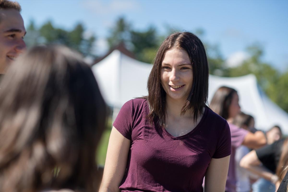 Ethnic and Gender Studies Student Outside at Campus Event.