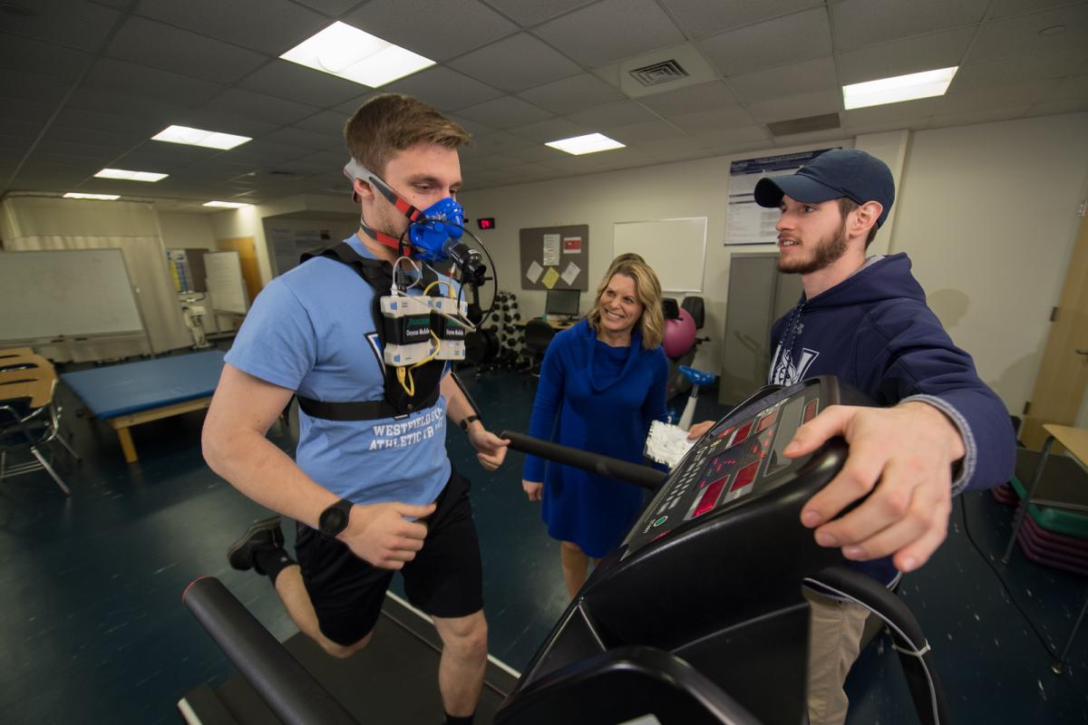 Movement Science student running on a treadmill during a lab activity.
