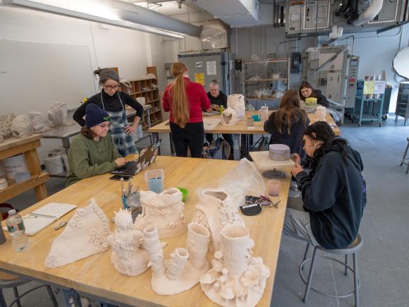 Dower Studio 168 with student working on a project with faculty member.