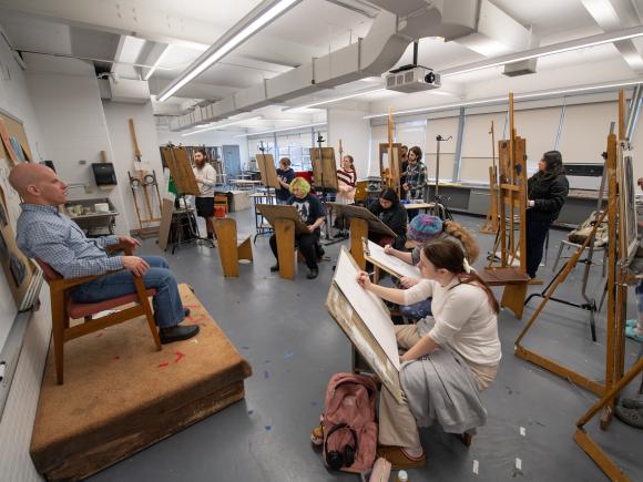 Dower 274 Painting Studio with students in front of easels. 