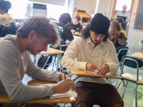 Two students in a criminal justice class working on an assignment.