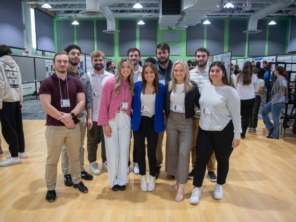 Group of Movement Science students smiling at the undergraduate research conference.