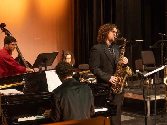 Students performing on stage during Westfield State University Music Department’s Jazz Night event.