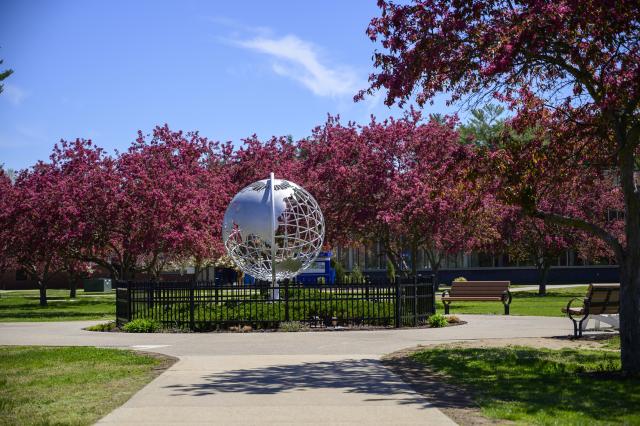 Photo of the globe on the campus green
