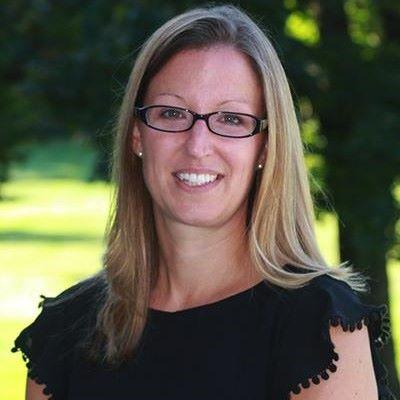 Headshot of Emily Gibbings, Associate Director