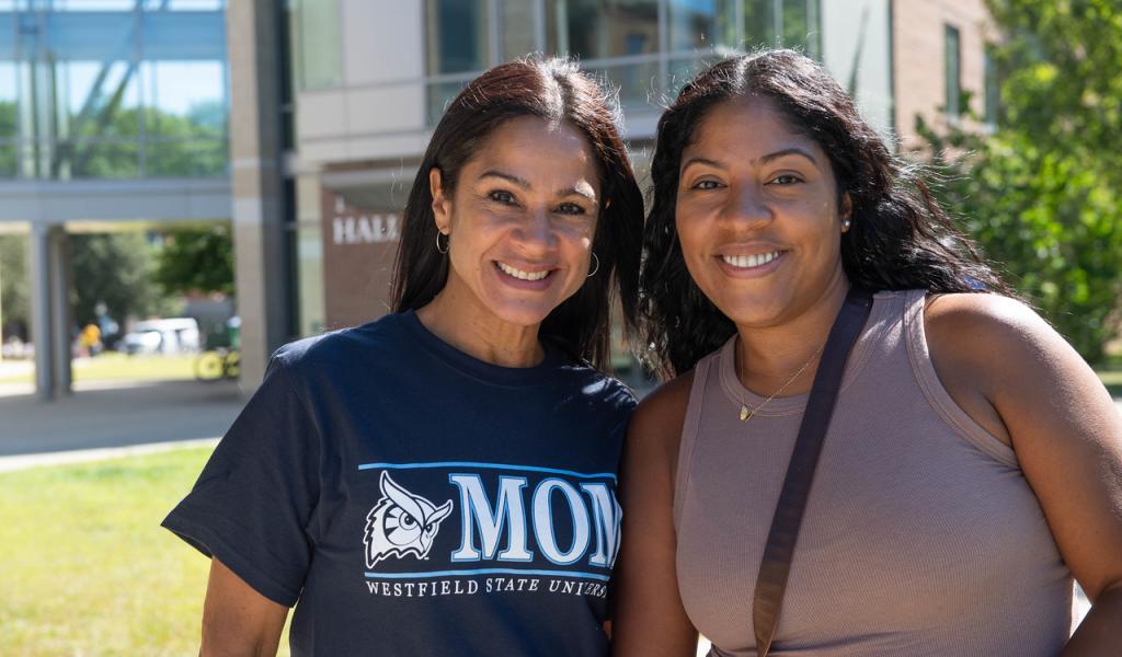 Mother and daughter smiling together on Move-In Day.