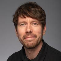 Headshot of Brandon Fredette.