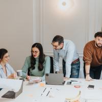 Team working on a project around a table